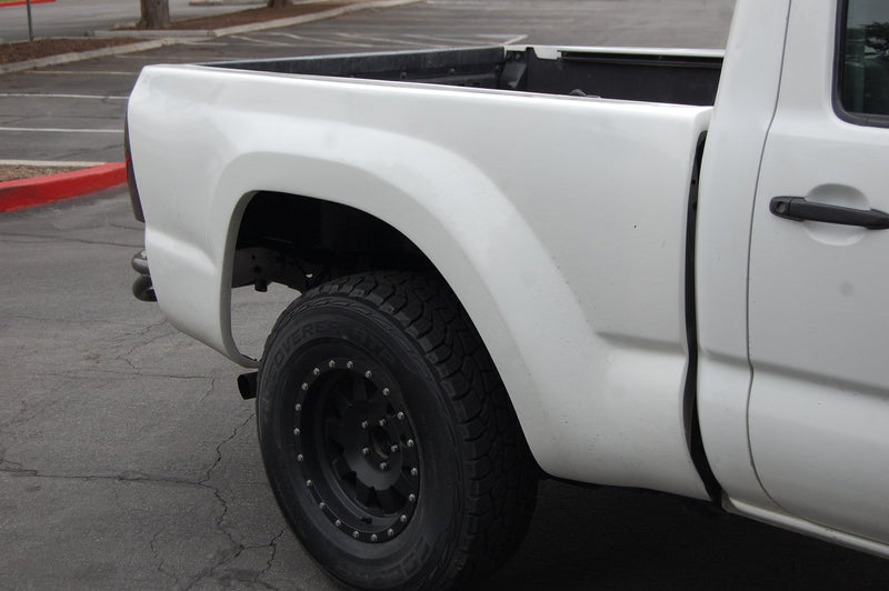Load image into Gallery viewer, 05-15 Toyota Tacoma 4" Bulge Flat Top Off Road Fiberglass Bedsides - 6.0 Bed - McNeil Racing Inc