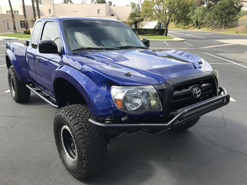 Load image into Gallery viewer, 96-04 Toyota Pickup to 12 Tacoma Off Road Fiberglass One Piece Conversion - McNeil Racing Inc
