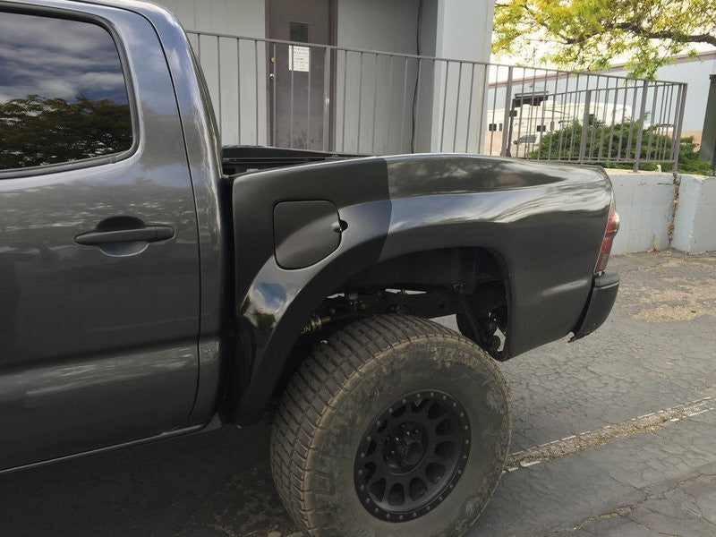 Load image into Gallery viewer, 05-15 Toyota Tacoma 4" Bulge TT Style Off Road Fiberglass Bedsides - 5.0 Bed - McNeil Racing Inc