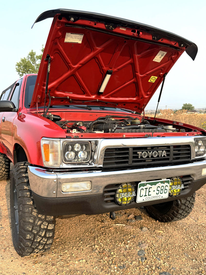 Load image into Gallery viewer, Front view of Toyota Pickup with Spiker hood struts