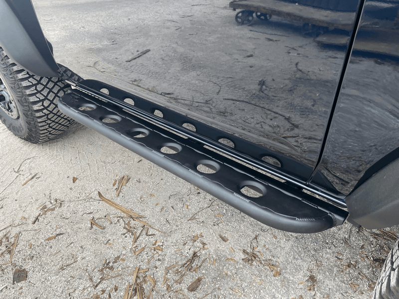 Load image into Gallery viewer, 2021+ Bronco 4Dr Frame Mounted Rock Sliders - True North Fabrications
