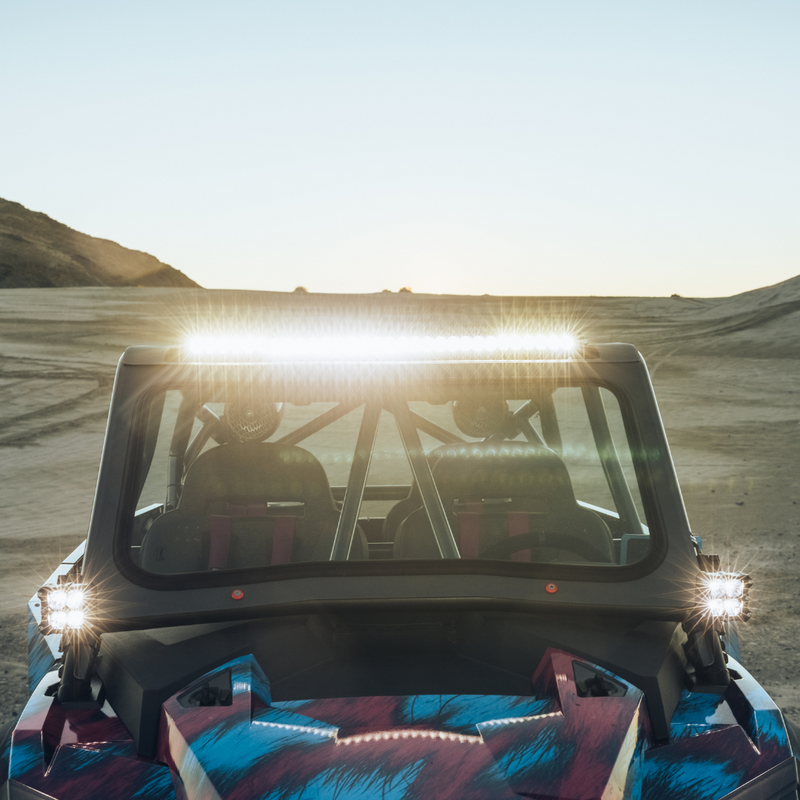 Load image into Gallery viewer, clear 30 inch led light bar mounted on a polarizs rzr