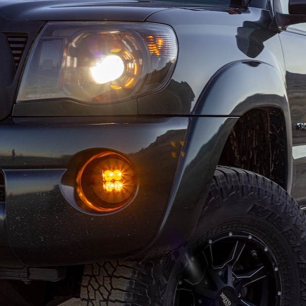 Load image into Gallery viewer, amber led fog light kit mounted on a toyota tacoma