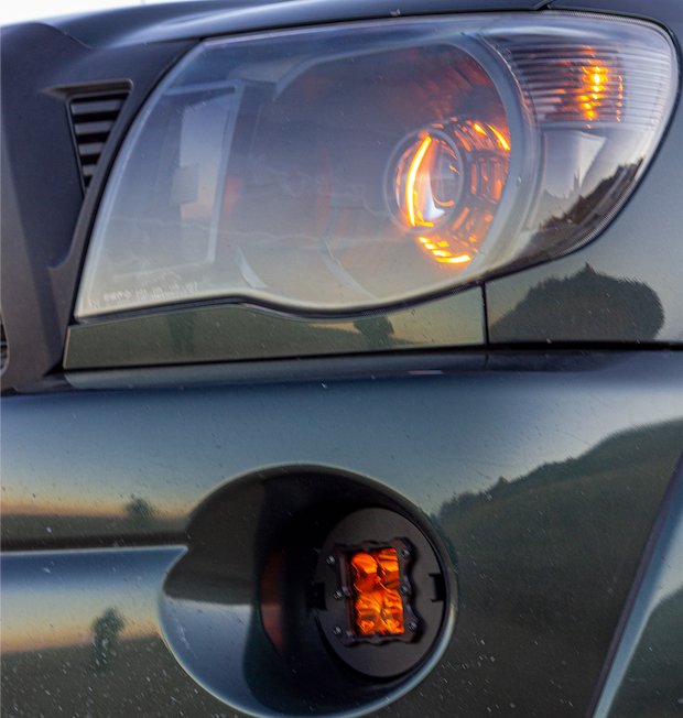 Load image into Gallery viewer, amber led fog light kit mounted on a toyota tacoma