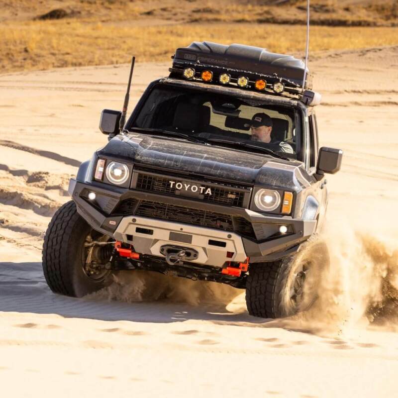 Load image into Gallery viewer, Toyota Land Cruiser 250 with Old Man Emu BP-51 suspension off road
