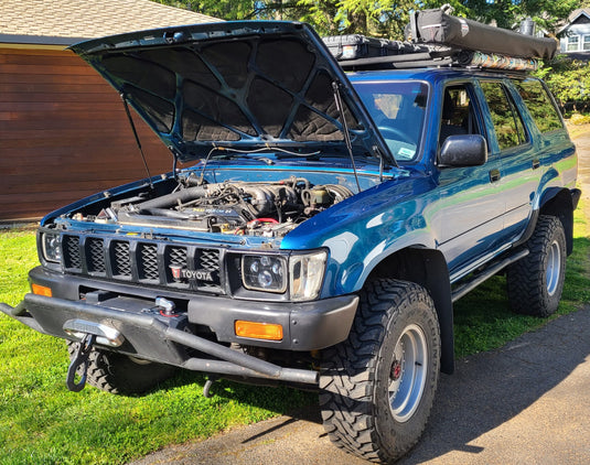 Spiker hood struts installed on a blue 2nd Gen 4Runner