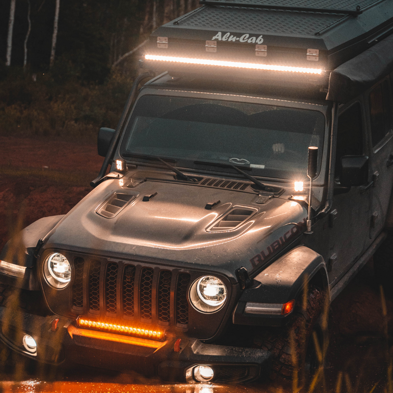 Load image into Gallery viewer, quattro led lights mounted on a jeep as a ditch light
