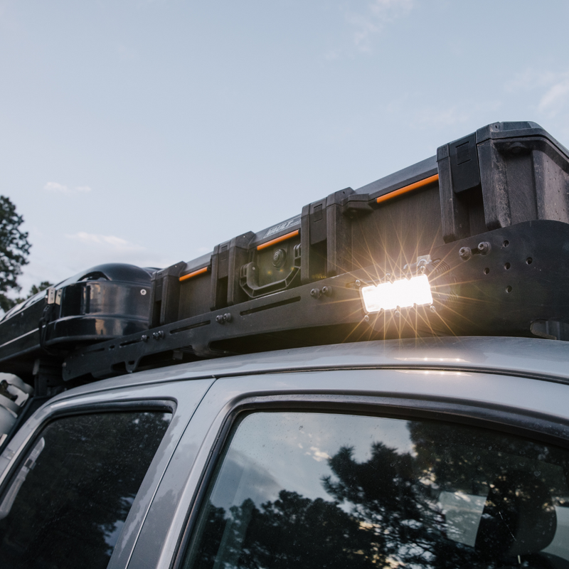 Load image into Gallery viewer, ba-4 led light mounted on an aftermarket roof rack

