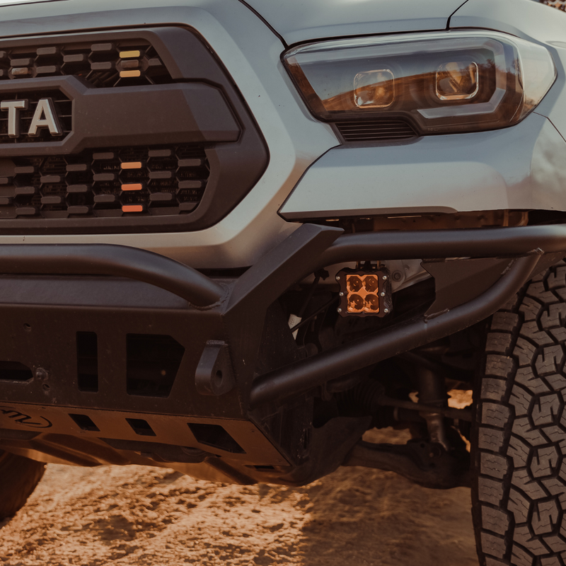 Load image into Gallery viewer, quattro led pod light mounted on a toyota tacoma as a fog light
