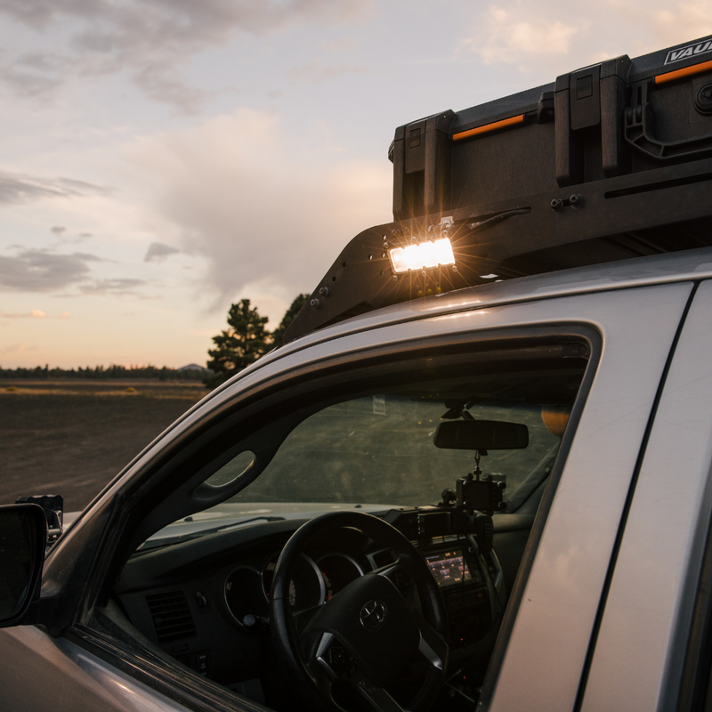 Load image into Gallery viewer, ba-4 led light mounted on an aftermarket roof rack
