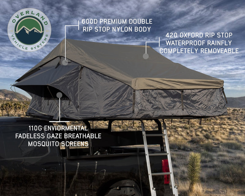 Load image into Gallery viewer, Roof Top Tent 4 Person Extended Roof Top Tent Dark Gray Base With Green Rain Fly With Bonus Pack Nomadic Overland Vehicle Systems - Overland Vehicle Systems
