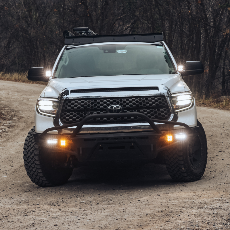 Load image into Gallery viewer, led quattro light mounted as ditch lights on a toyota tundra
