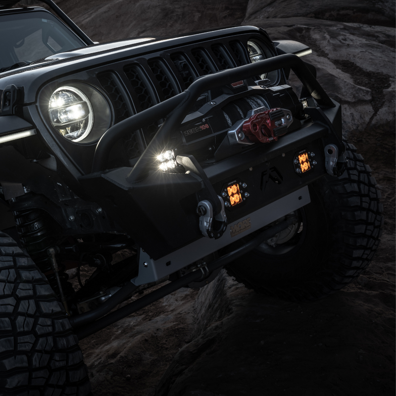 Load image into Gallery viewer, flush mount quattro amber led pod light mounted on a jeep bumper
